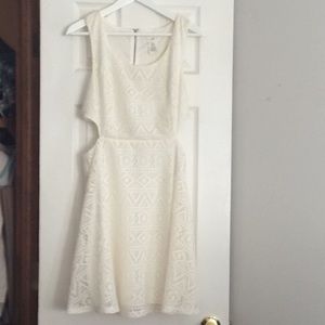 Lacy dress with cut out sides